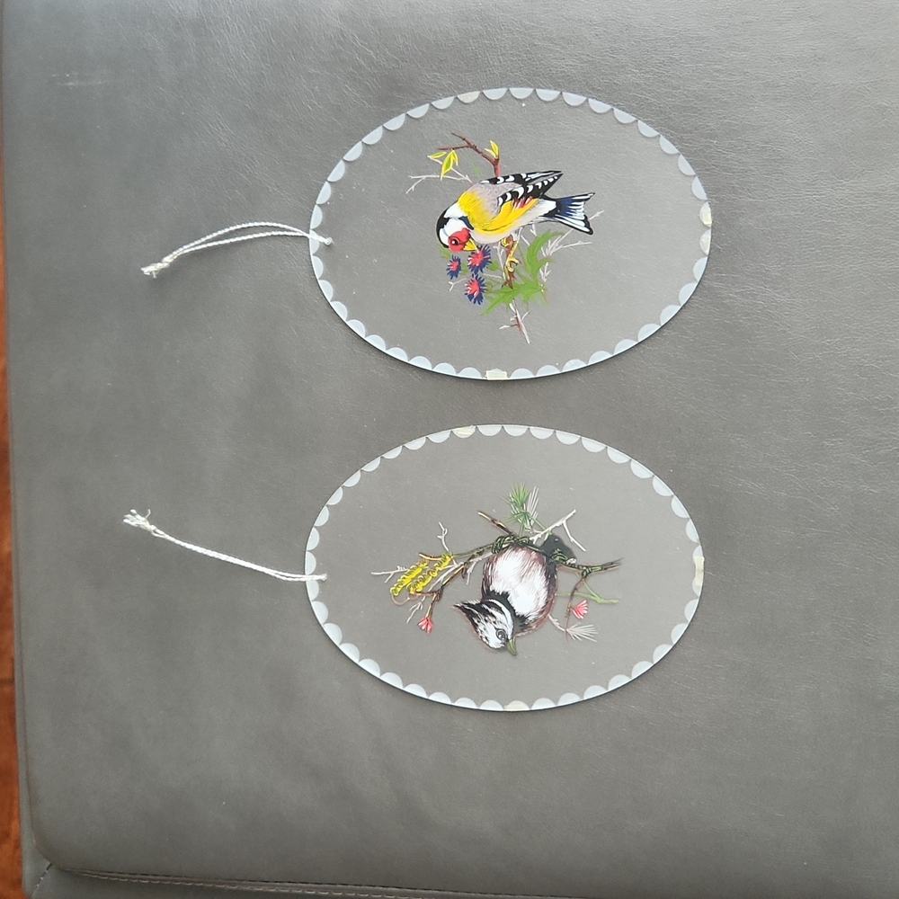 Etched oval glass of birds on tree limb with flowers